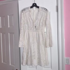 A line white lace BCBG dress with bell sleeves